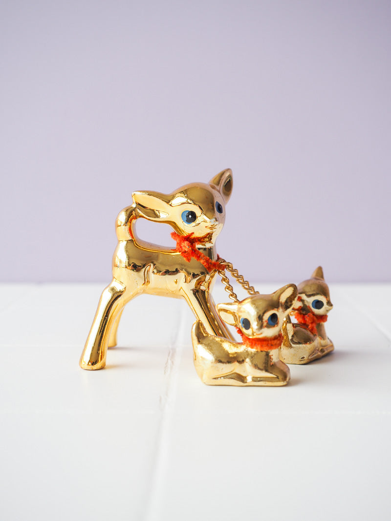 Biche en porcelaine dorée et ses bébés