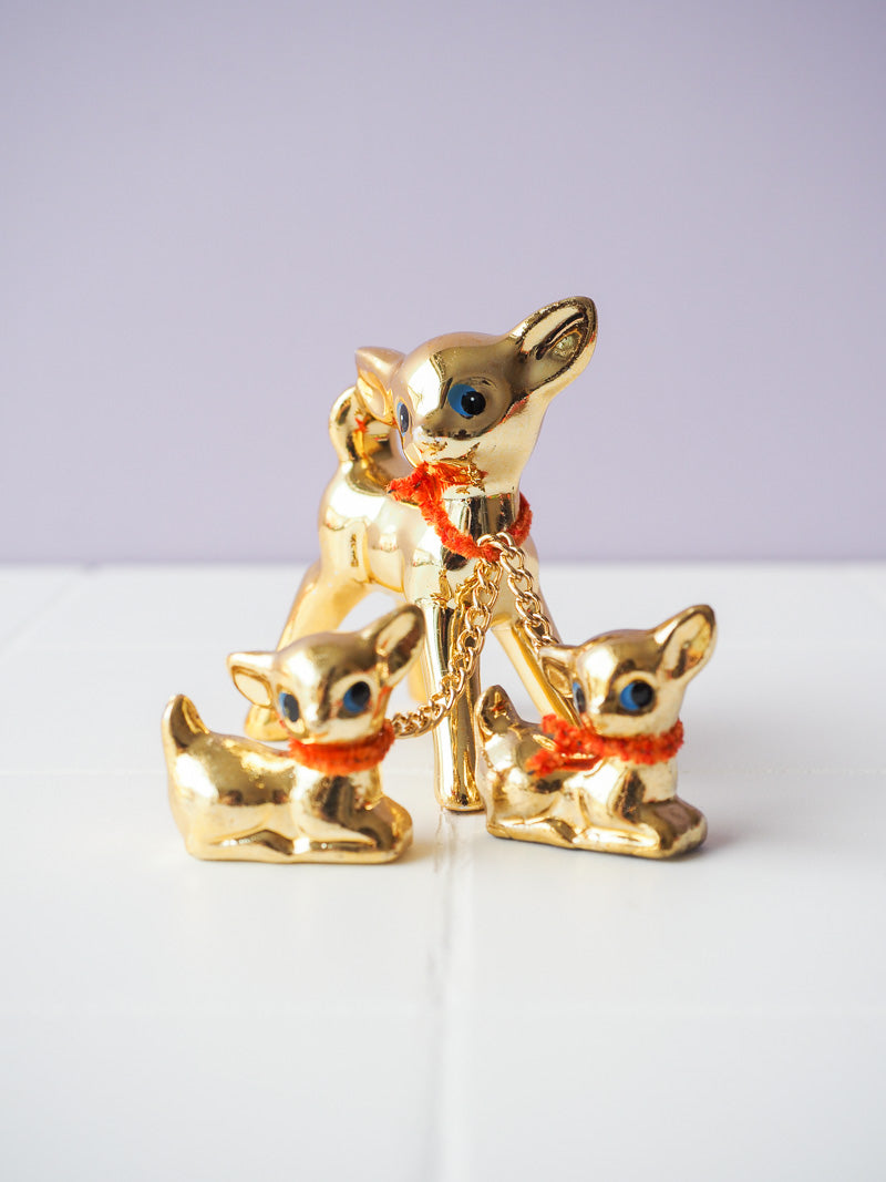 Biche en porcelaine dorée et ses bébés