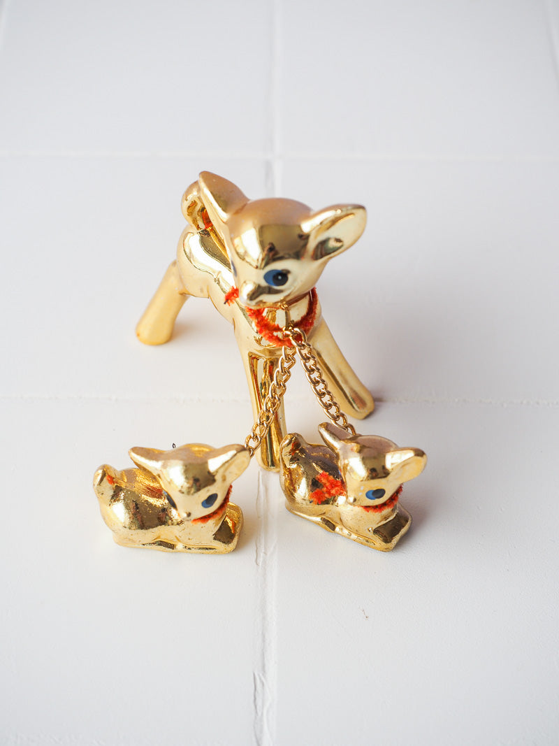 Biche en porcelaine dorée et ses bébés