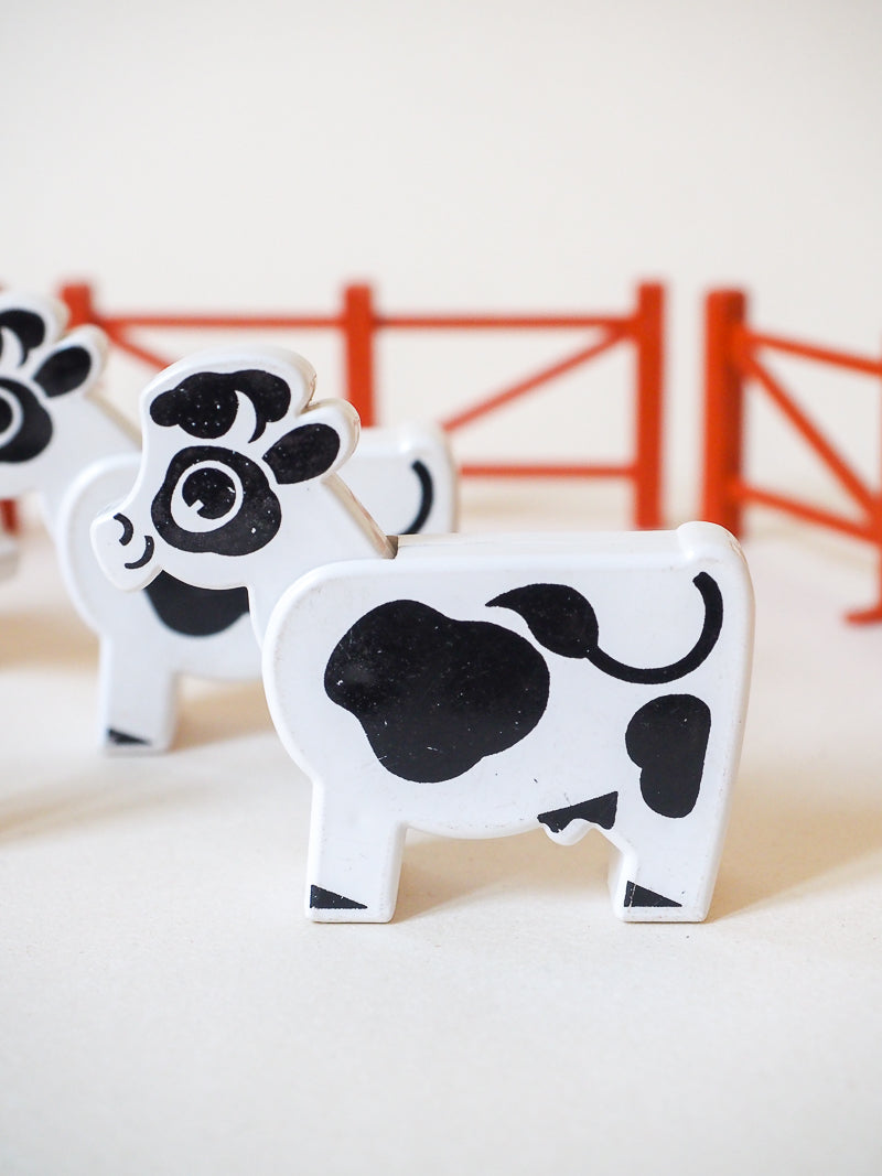 Les Minitou les vaches noires et blanches - Educalux
