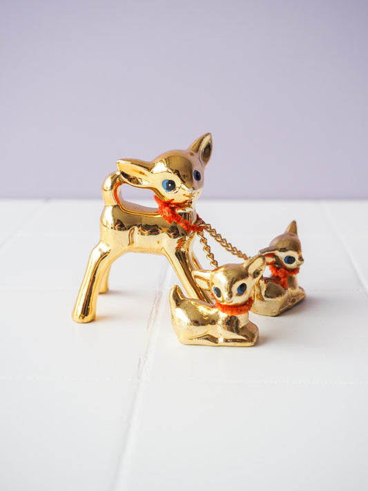 Biche en porcelaine dorée et ses bébés