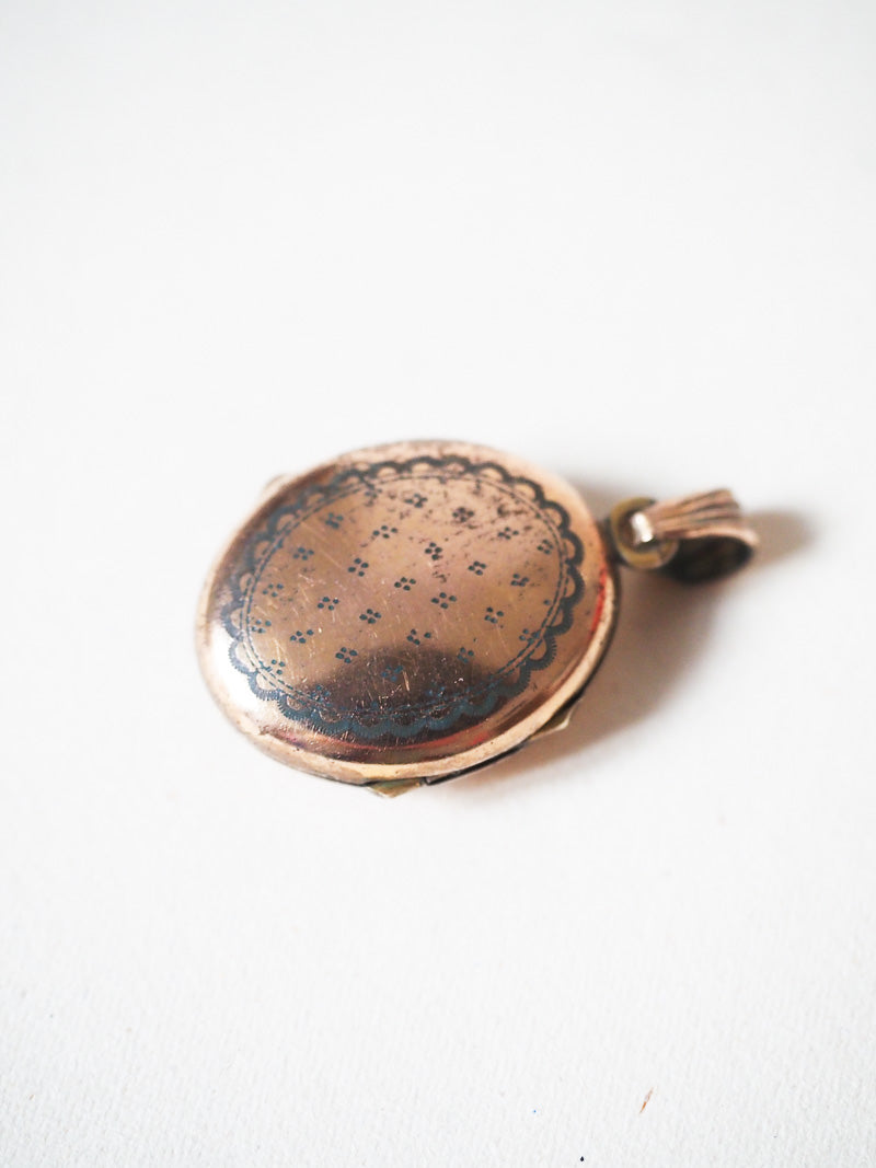 Médaillon religieux ancien qui s'ouvre pour photo – Plaqué or – Cabochon violet – Objet secret