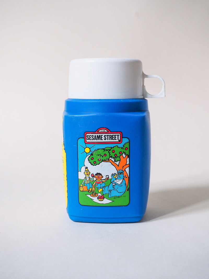 Thermos Flask Roughneck Flip Top  – Gourde vintage Sesame Street – Années 80 – Objet collector