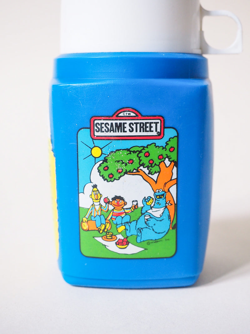Thermos Flask Roughneck Flip Top  – Gourde vintage Sesame Street – Années 80 – Objet collector