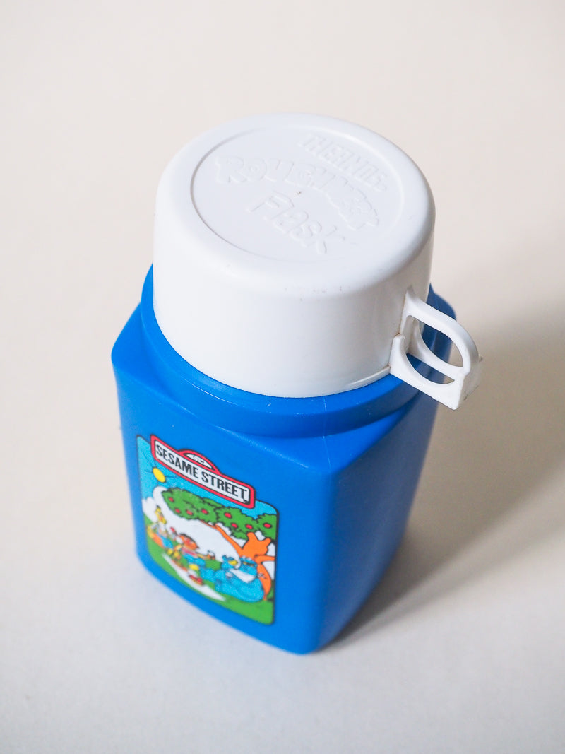 Thermos Flask Roughneck Flip Top  – Gourde vintage Sesame Street – Années 80 – Objet collector