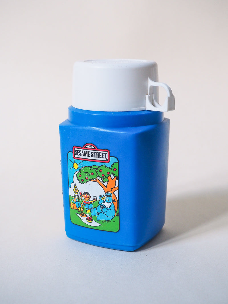Thermos Flask Roughneck Flip Top  – Gourde vintage Sesame Street – Années 80 – Objet collector